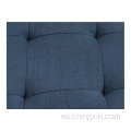 Sofá de ocio de tela azul con patas de madera maciza